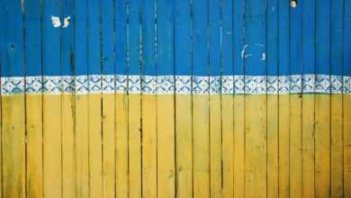 yellow and blue wooden fence