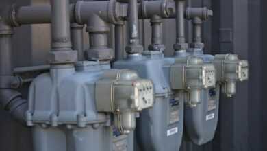 a row of water pumps sitting next to each other