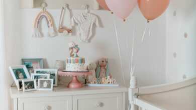 a baby's room with a crib and a dresser